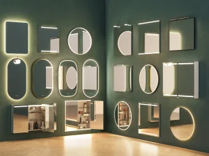 A green wall displaying a variety of backlit mirrors in different shapes—rectangles, circles and ovals—some with shelves or cabinets.