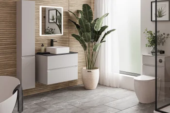 Modern bathroom with wood slat wall, floating white vanity with sink, backlit mirror, cabinet, potted plant, sheer curtains, toilet and glass shower.