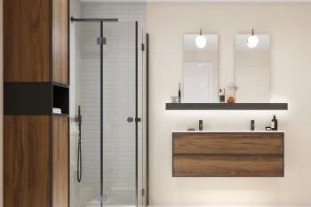 Modern bathroom featuring a glass-framed shower, dark metal fixtures, tall wood cabinets, a floating double vanity, two backlit rectangular mirrors and a beige rug.