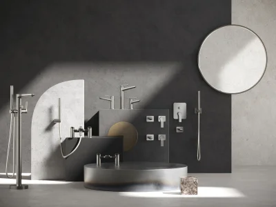 Modern bathroom showroom with chrome faucets, showers and controls on dark geometric panels, a circular platform tub and a large round mirror.