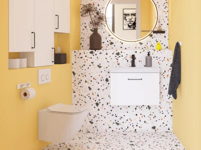 Bright yellow bathroom with terrazzo walls, white floating vanity, backlit mirror, black fixtures, brown vase with dried stems, and a yellow duck.