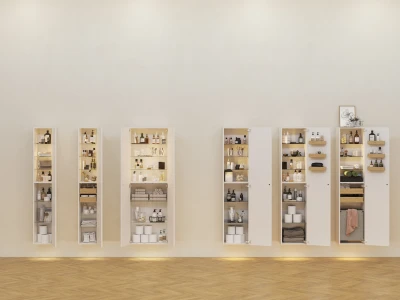 Row of white wall-mounted cabinets with open doors, neatly showing toiletries, towels and bottles in a minimalist showroom with a wooden floor.