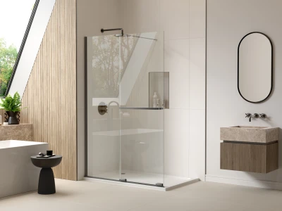 Contemporary bathroom with grey textured walls, a black-framed frosted glass shower partition, metal fixtures, wooden shelving, a tall plant and a white tub.