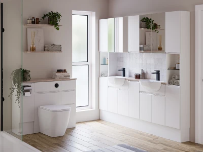 Bright modern bathroom with white vanity and double sinks, mirrored wall cabinets, glass shower, wooden floor, and a tall window; plants and towels on shelves.